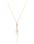 Qlassico pendant necklace from the Celestial Capsule, featuring a round Akoya pearl set in 18K yellow gold.