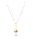 Qlassico pendant necklace from the Celestial Capsule, featuring a round golden South Sea pearl set in 18K yellow gold.