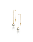 Qlassico dangling earrings from the  Celestial Capsule, featuring a pair of round Akoya pearls set in 18K yellow gold.